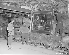 Le tableau a été transporté avec d'autres tableaux de la galerie nationale allemande dans une mine pour la protéger des bombes durant la Seconde Guerre mondiale. Cette photographie de 1945 montre des soldats américains avec le tableau dans la mine de sel de Merkers.