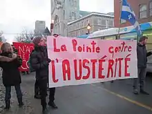 Manifestation contre l'austérité organisée par les groupes communautaires de Pointe-Saint-Charles, le 25 février 2015.