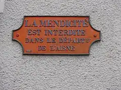 Plaque La mendicité est interdite dans le département de l'Aisne.