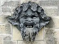 Trois des mascarons par Auguste Rodin (1878), aujourd'hui au  parc de Sceaux.