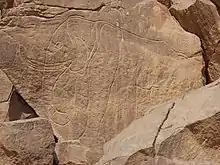 Pétroglyphe représentant un éléphant, site de Wadi Mathendous, Libye