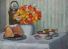 Tableau représentant une table fleurie avec deux tasse en porcelaine et un kouglof entamé.