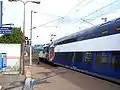 Une rame VB 2N quitte la gare en direction de Paris-Saint-Lazare