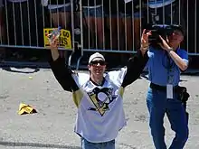 Photographie de Talbot lors de la parade de la victoire des Penguins