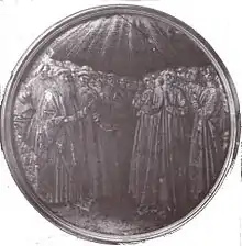 Scène représentant sur la droite sept personnes en prière, tournées vers le ciel, entourées d'une foule
