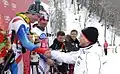 Le président Medvedev félicite le Suisse Beat Feuz pour l'épreuve de descente, le 11 février 2012, à Rosa Khutor