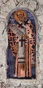 fresque dans une alcôve : un saint évêque