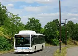 Mercedes-Benz Citaro O530Ü GNC no 421 de Transdev Les Cars d'Orsay, sur le TCSP Massy-Saclay.