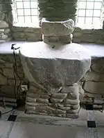 La « pierre d'autel » de Stobo Kirk sur laquelle Merlin a été converti au christianisme