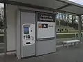 Enseigne d'une station et équipement d'achat automatisé de billetterie.