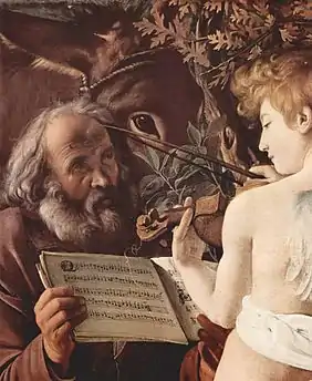 Détail d'une peinture où l'on voit saint Joseph tenant une partition et faisant face à un ange qui joue du violon.
