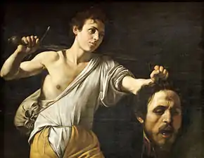 Peinture. Un jeune homme avec une épée tient à la main une tête d'homme tranchée.