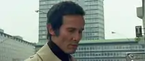 Walter Grandi (Henry Silva)