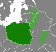 Carte : Pologne (vert foncé) et zones de Tchéquie, Biélorussie, Ukraine, Lituanie et Lettonie (vert clair).