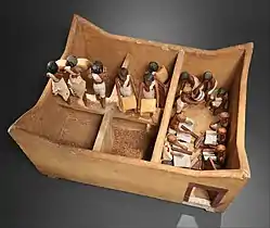 Maquette d'un grenier à grains avec des scribes, tombeau de Méketrê, MMA 20.3.11.