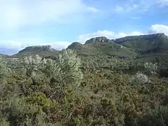 La Barcella, la Mola Llarga, lo Curolló, la Roca Mitxdia, Coll de la Creu.