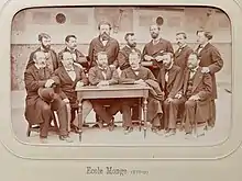1879, les enseignants et le directeur Aimé Godard (à la table à droite).