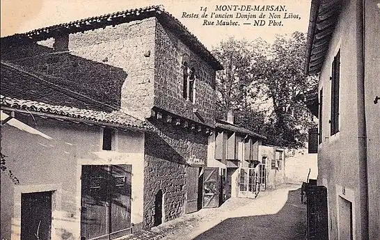 Ancienne carte postale. La légende fait une confusion entre la maison romane du 6 rue Maubec et le château de Nolibos (appelé « donjon de Non Libos »), entièrement détruit au XVIIIe siècle, et qui se situait à 150 mètres plus à l'Est