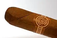 Photo d'une bague d'un cigare Montecristo.