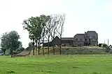 Ferme de Montjoie/ Les Burettes : ancienne propriété fortifiée des Templiers sur une motte.