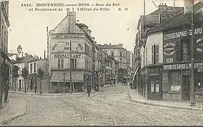 Le boulevard de l'Hôtel-de-Ville au croisement de la rue du Pré (aujourd'hui rue du Capitaine-Dreyfus).
