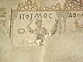 Mosaïque des auriges vainqueurs portant des inscriptions grecques.