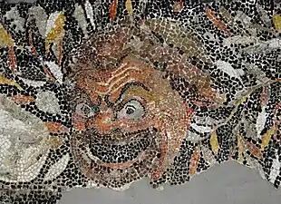 Mosaïque représentant un masque de comédie.