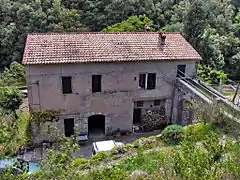 Le moulin à blé et centre de vie.