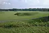 Vue du Moundville Archaeological Site depuis le sommet du tertre B, en regardant vers le tertre A et vers la place.