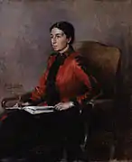 Tableau représentant une femme en robe rouge et noire