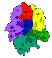 Les différents arrondissements de la ville ; les zones sombres désignent les parties construites de la ville