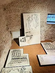 Fragments des mosaïques du sol des deux cathédrales romanes, XIe et XIIe siècles.
