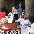 Vendeuse de Muyuchi sur la Plaza Mayor.