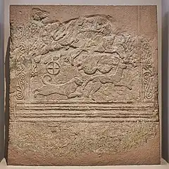 Stèle funéraire représentant une scène de chasse. Mycènes, « cercle A », HR I (vers 1550-1500), Musée national archéologique d'Athènes.