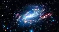 NGC 925 dans le domaine de l'infrarouge. (Spitzer, NASA/JPL-Caltech/K. Gordon (Space Telescope Science Institute) and SINGS Team)