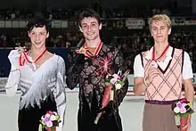 Podium du Trophée NHK 2009 avec Johnny Weir et Michal Brezina