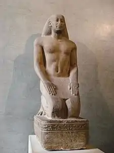 Nakhthorheb, haut fonctionnaire en prière. Quartzite, H. 1,4 m. Règne de Psammétique II (595-589). Louvre