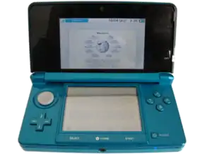 Nintendo 3DS bleue ouverte, avec le navigateur web lancé, affichant la page Wikipedia.org.