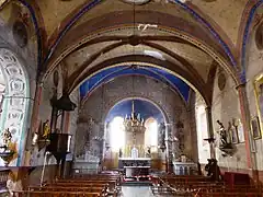 Nef unique de l'église Saint-Jean-Baptiste de Rivel, de style languedocien, caractérisée par des arcs surbaissés sur lesquels sont appuyées les croisées d'ogives.