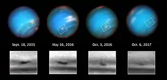 Quatre images à un an d'écart de la même zone de la planète montrant qu'une tache diminue de taille.