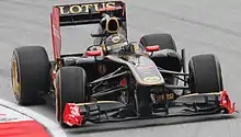 Photographie de Nick Heidfeld dans le cockpit de sa monoplace