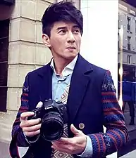 Le chanteur et acteur Nicky Wu (en)).