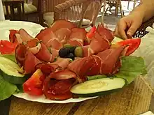 Prosciutto servi