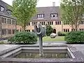 Sculptures and a pond in the Quad