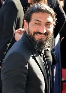 Numan Acar dans le rôle d'Haissam Haqqani.