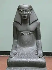 Statue d'un poseur de sceaux et grand intendant, XIIIe dynastie, v. 1700. Temple d'Amon à Karnak.Ny Carlsberg Glyptotek