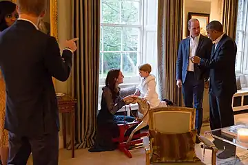 Le prince George avec ses parents et le couple Obama en avril 2016.