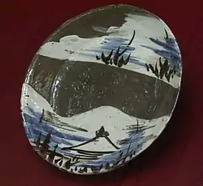 Ogata Kenzan. Coupe ovale à décor de paysage. XVIIIe siècle