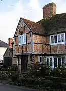Maison du XVIIe siècle à pans de bois et hourdis de briques en épi dans l'Sussex de l'Est (Angleterre).