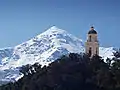 Clocher de l'église Saint-Nicolas et le San Parteo.